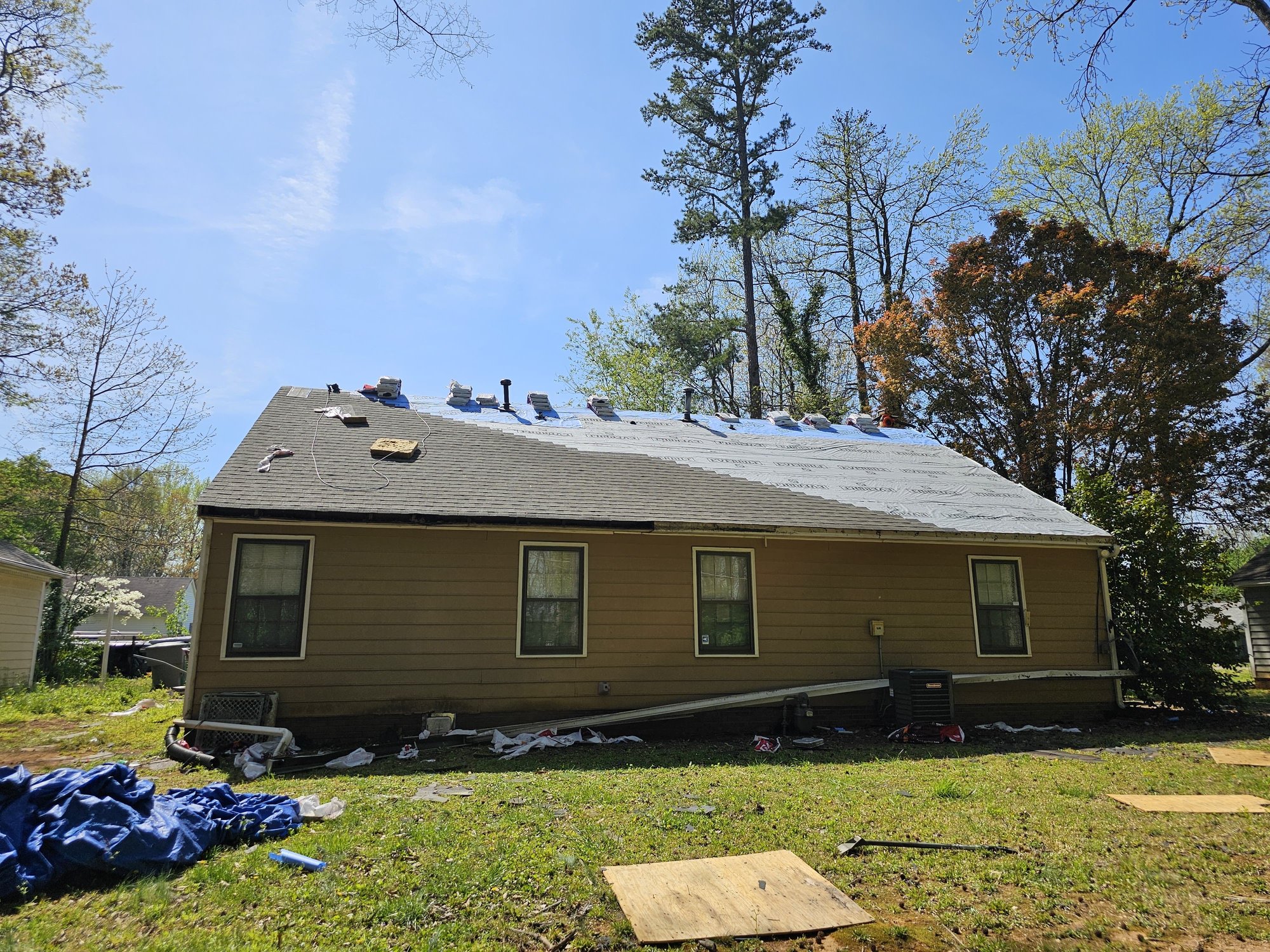 D&S crew mid-roof replacement on a residential home